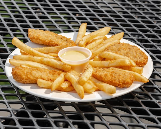 Kids Chicken Strips with Fries.